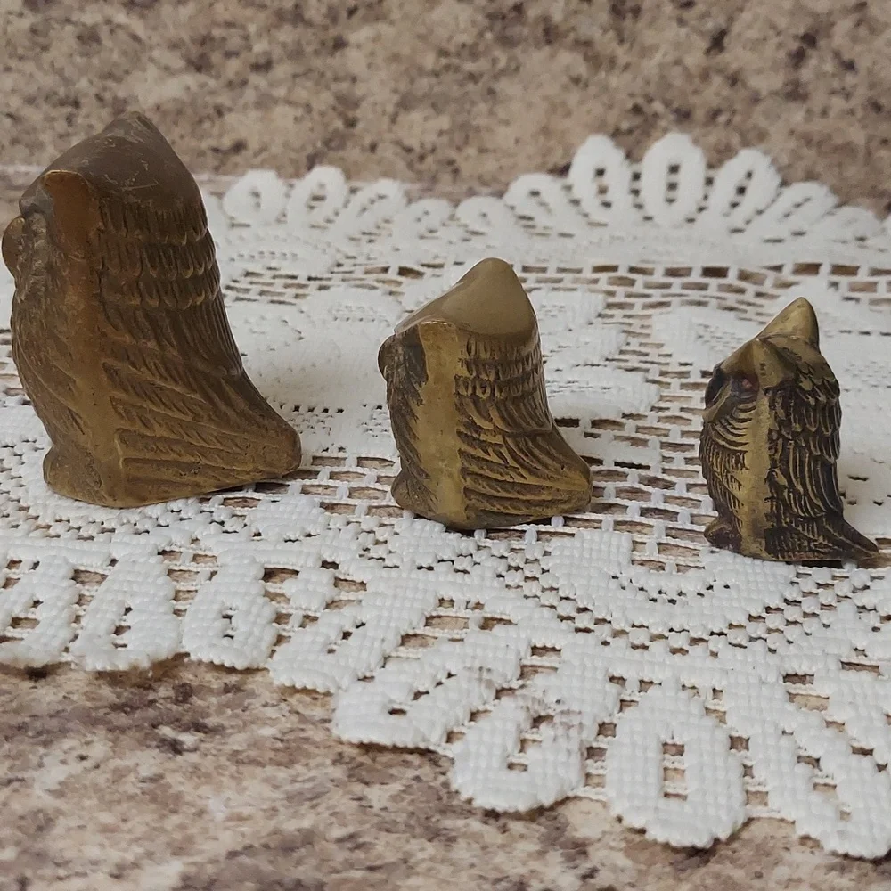 Bronze owl trio
